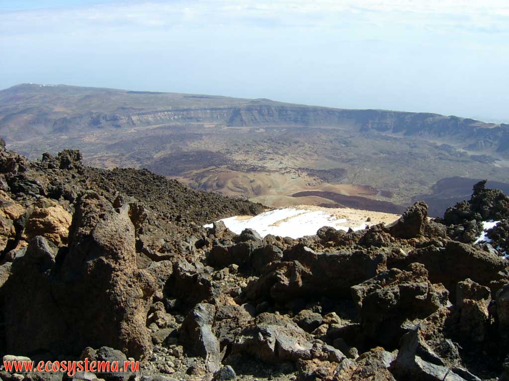 View to the Las Canadas caldera from the Teide volcano top.
The Las Canadas caldera - the crater of the ancient proto-volcano 26 kilometers in diameter.
Shooting point is at 3550 meters above sea level. Tenerife Island, Canary Archipelago