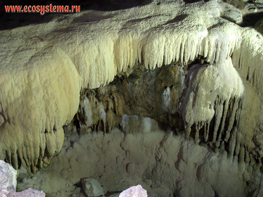 Sinter-droplet formation - deposits of calcite in the New Athos karst cave at the foot of Apsar (Iver) mountain. Western Caucasus, the Republic of Abkhazia