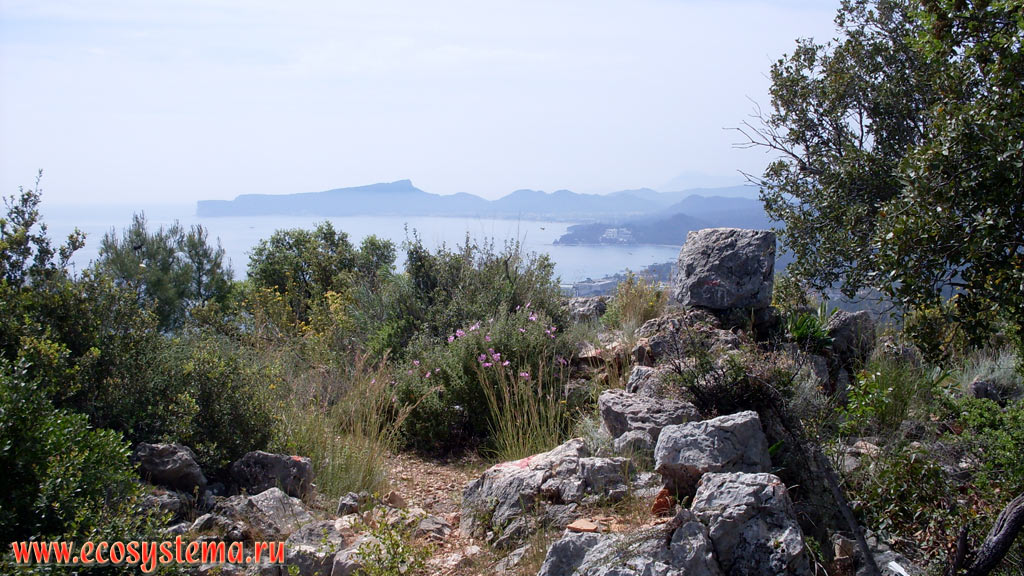 Views of the Mediterranean coast and bays near the village of Goynuk and Kemer city (away)