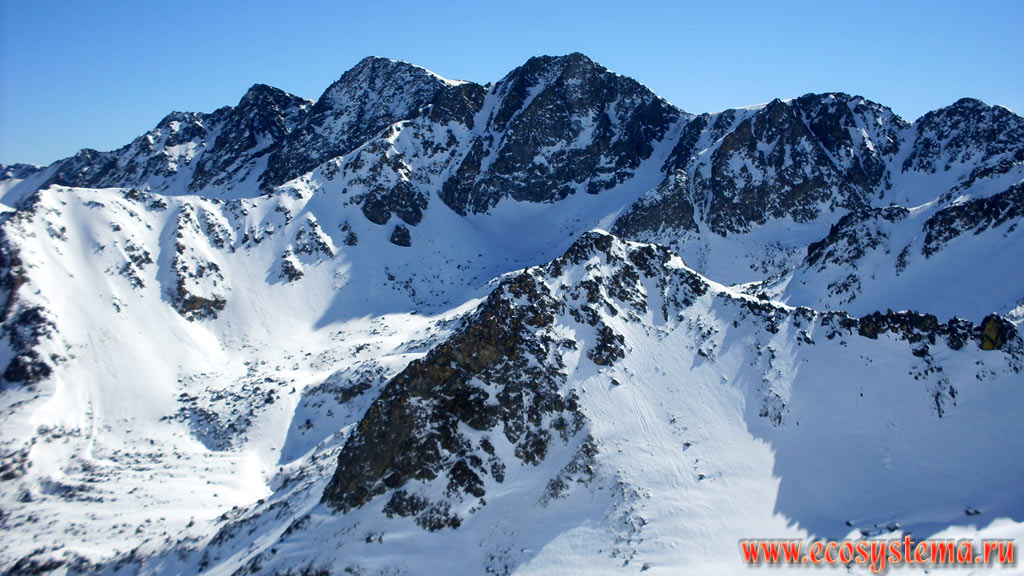 The tops of the mountain ranges of the Pyrenees Mountains in the zones of subalpine and alpine meadows