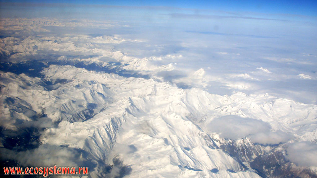 View from the plane on the mountain ranges of the Eastern Alps