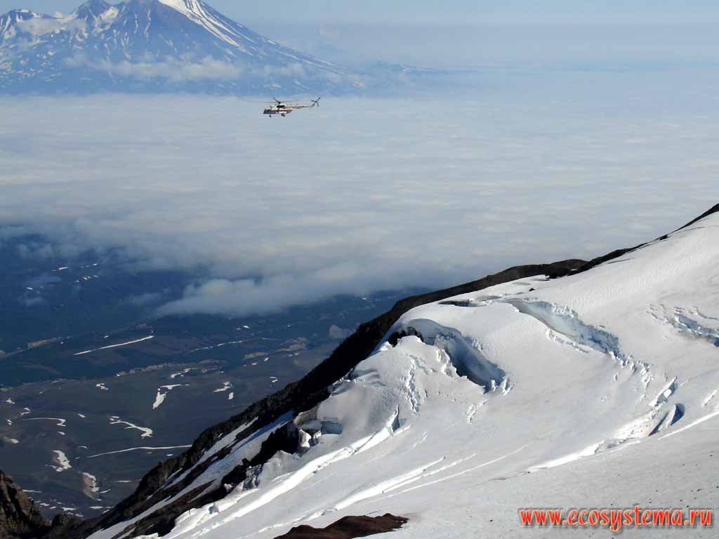 Snowfields slipping down from the Avachinsky volcano slope.
View to the Nalychevskaya Valley