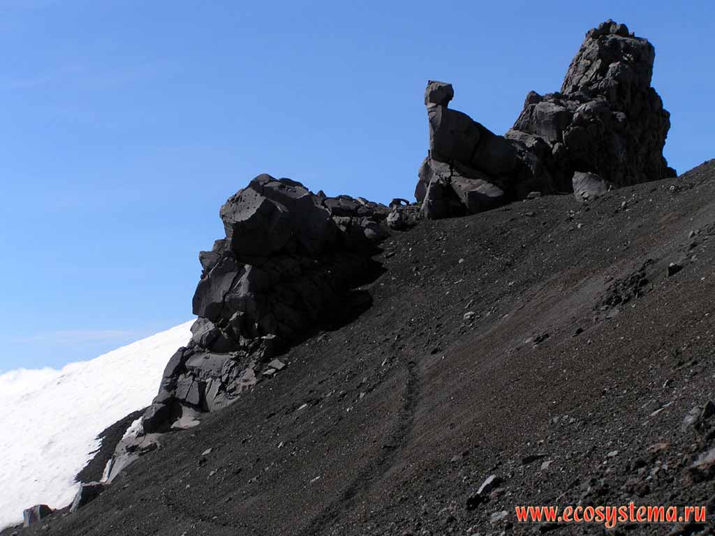 Basalt-andesit extrusion - rock Alpinist on the Avachinsky volcano slope