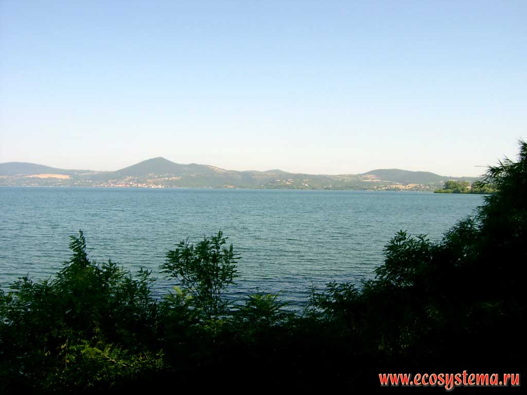 Bracciano Lake (Lago di Bracciano) � rounded shape, with a lake basin of volcanic origin, surrounded by the foothills of the Apennine Mountains. Central Italy, the province of Viterbo, Lazio region (near Rome)