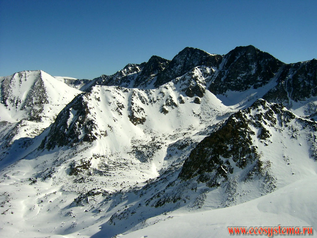 The tops of the mountain ranges of the Pyrenees Mountains in the zones of subalpine and alpine meadows
