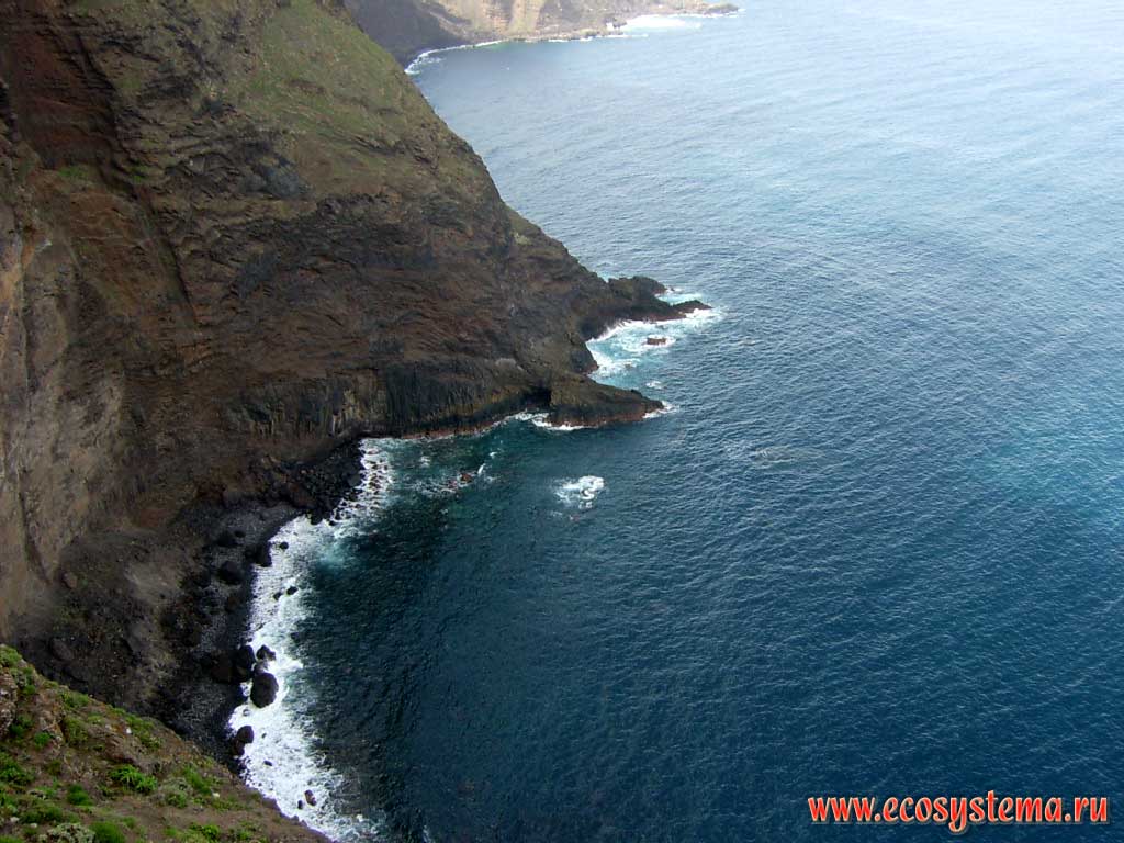 Coastal cliffs and surf zone - open-cast of the volcanic rocks.
Road to the Teno peninsula. North-west coast of the Tenerife Island, Canary Archipelago